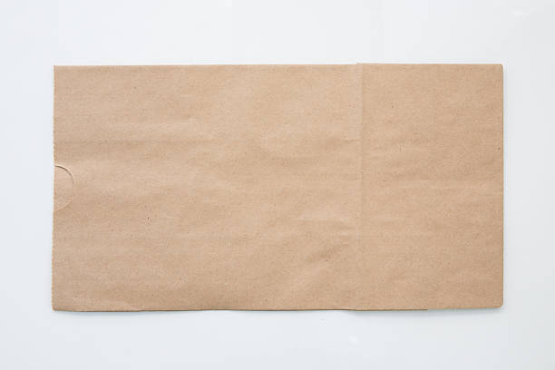 istock brown paper bag isolated on white background 519341682