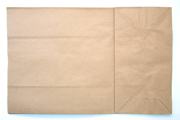 istock brown paper bag isolated on white background 519341744