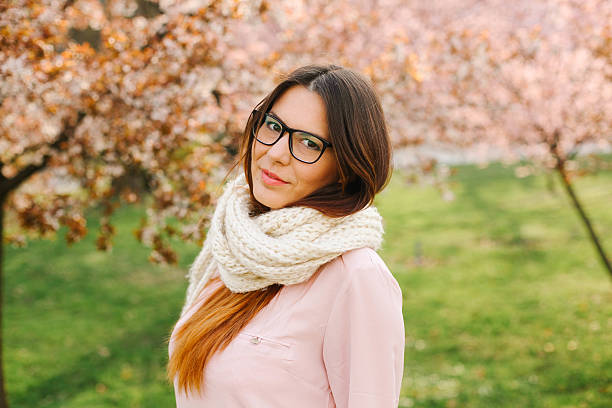 istock Beautiful girl smiling in the park in spring. 519344012