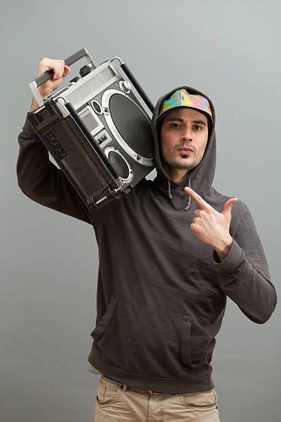 istock Young Man Listening Boombox 519345744