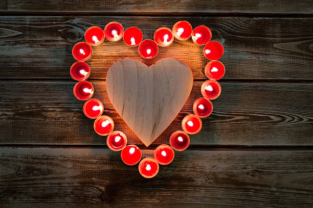 istock Heart of burning candles 519355228