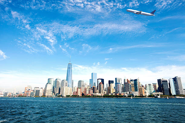 istock New York City Skyline with Airplane 519356486