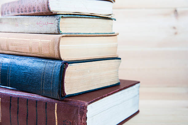 istock Old books on a wooden shelf 519356968