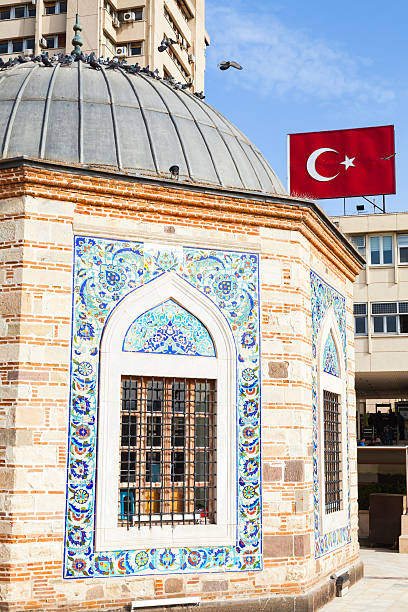 istock Ancient Camii mosque and Turkish flag 519357340