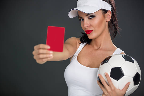 istock Young attractive woman showing  red card 519359373