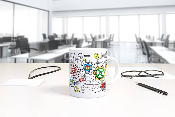 istock Cup with business scheme print and badge on the table 519359926