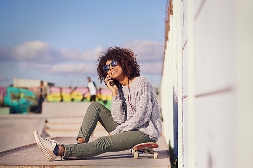 Shot of an attractive young skater at the skatepark