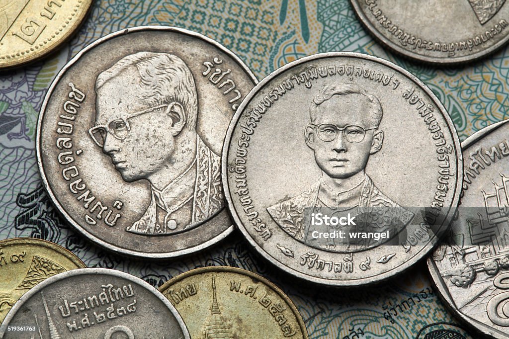 Coins of Thailand Coins of Thailand. King Bhumibol Adulyadej of Thailand depicted in the Thai baht coins. Arts Culture and Entertainment Stock Photo