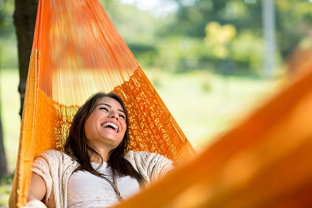 istock Cheerful girl enjoy in hammock 519361800