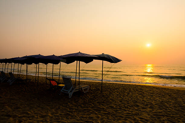 istock Sun shining on a beach umbrella. 519362515