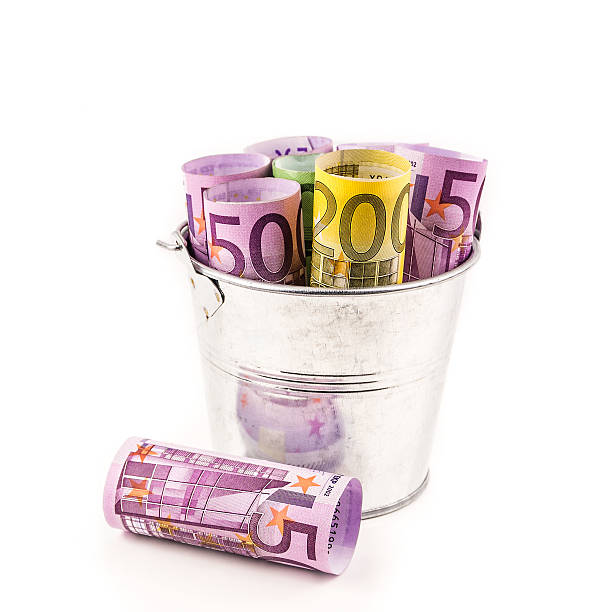 istock silver basket full of big euro banknotes 519363426
