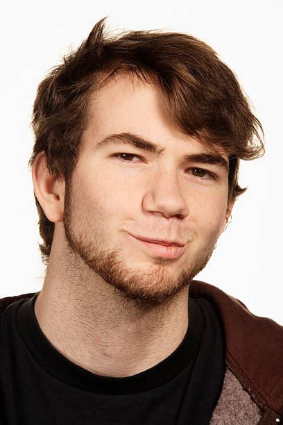 istock Young man making face, portrait, close-up 519363587