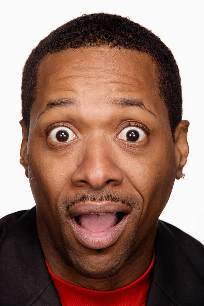 istock Man with mouth open, portrait, close-up 519363867