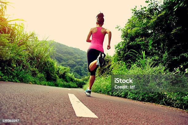 Runner Athlete Running On Forest Trail Stock Photo - Download Image Now - Active Lifestyle, Activity, Adult