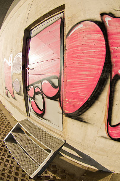 Red Grafitti on a concrete wall at sunny morning