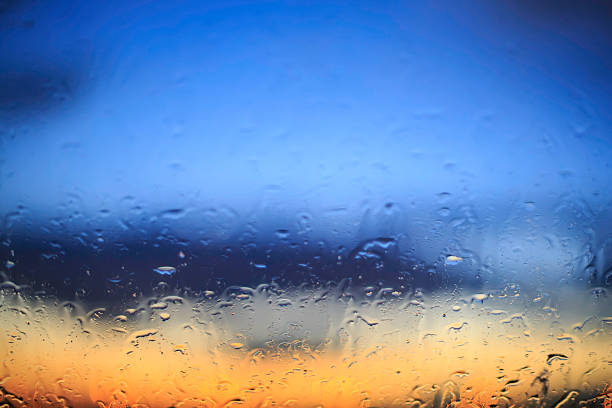 istock beautiful evening sunset through wet glass 519366880