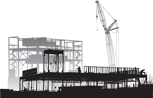 A vector silhouette illustration of a construction site where construction workers are erecting a building by framing it with the use of a crane.