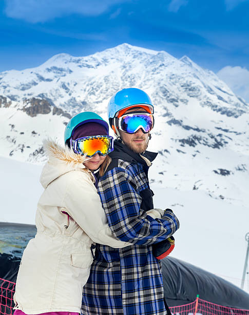 istock Happy young couple in mountains 519368978