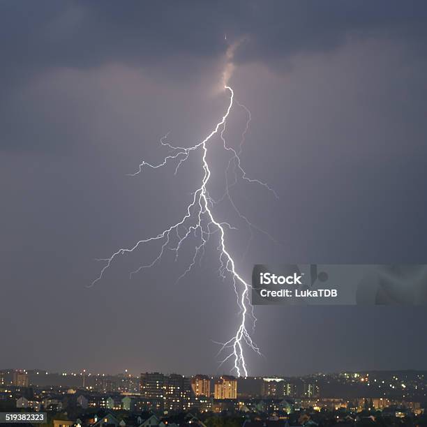 Lightning Strike Over Night City Stock Photo - Download Image Now - Bolt - Fastener, Lightning, Lighting Equipment