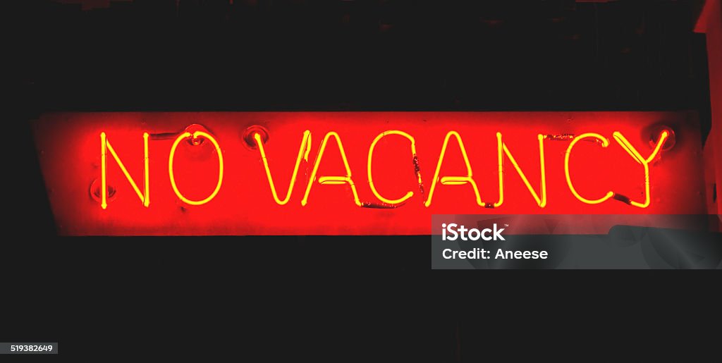 Neon Sign - No Vacancy Red neon sign of "No Vacancy" at night No Vacancies Stock Photo