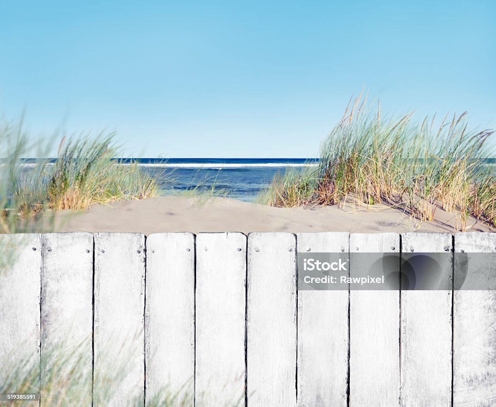 Beach and Fence Beach Stock Photo