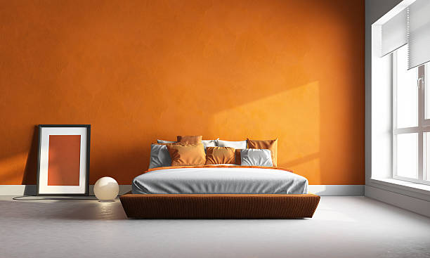 naranja, dormitorio - orange wall fotografías e imágenes de stock