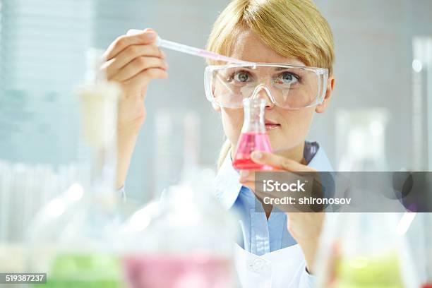 Working With Liquids Stock Photo - Download Image Now - Adult, Adults Only, Analyzing