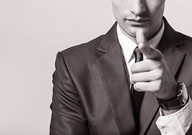 istock Business man points his finger at you 519387274