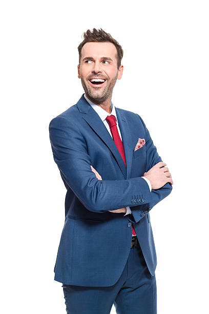 istock Happy businessman wearing suit, studio portrait 519387574