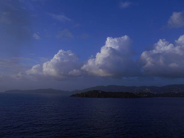 istock Caribbean Island with blue sky clouds and sea 519387756