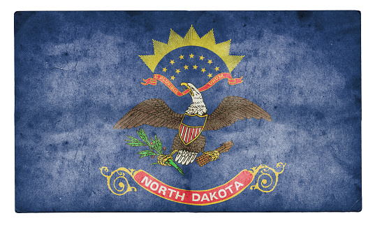 A stock photo of the North Dakota state flag in the USA. High resolution on a worn out grunge style textured background.