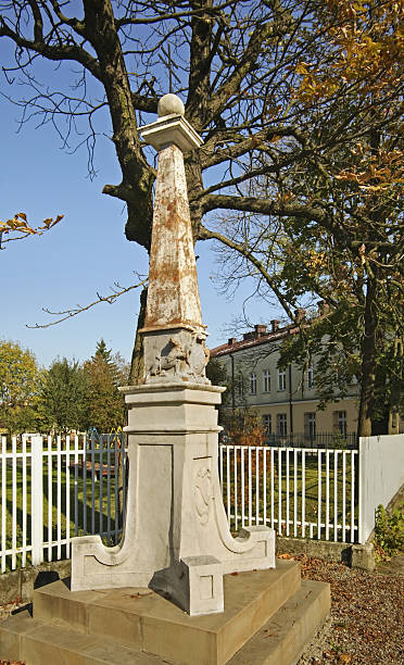 istock Old obelisk in park. Dabrowa Tarnowska. Poland 519391718