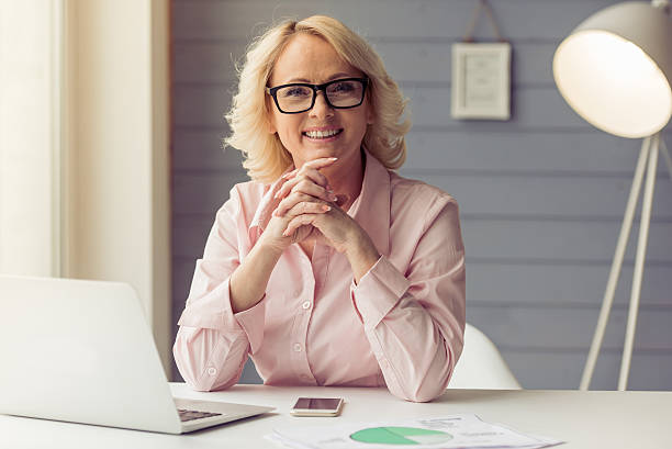 istock Beautiful old woman working 519391950