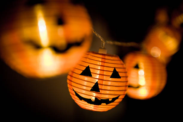 istock Halloween paper pumpkin lights 519392338