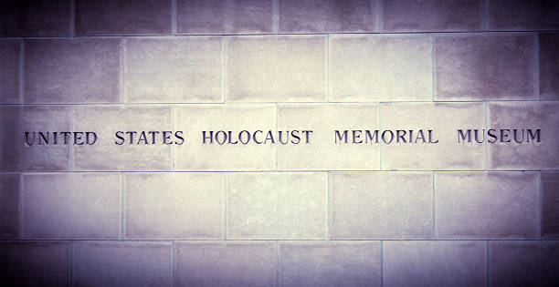 Washington DC, USA  - October 12, 2014: The US Holocaust Memorial Museum Sign carved in the wall at US Holocaust Memorial Museum in Washington, DC. USHMM is US official memorial to victims and survivors of the Holocaust