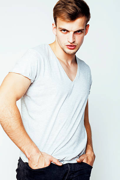 istock young handsome man on white background gesturing, pointing, posing emotional 519397458