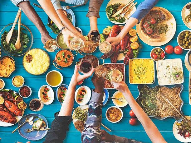 istock Friends Happiness Enjoying Dinning Eating Concept 519398974
