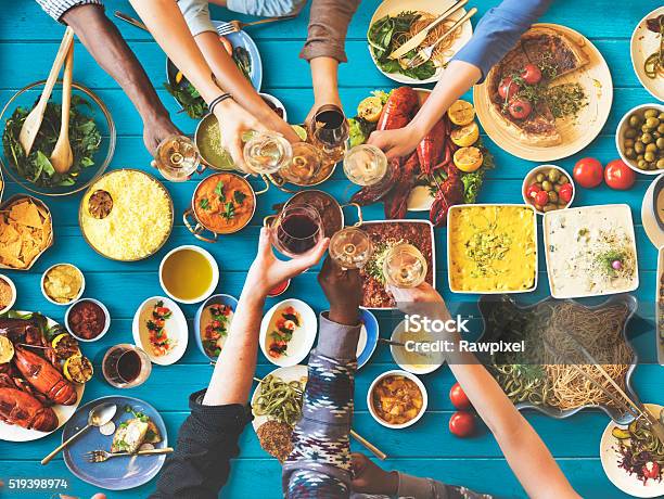 Friends Happiness Enjoying Dinning Eating Concept Stock Photo - Download Image Now - Mediterranean Food, Thai Food, Eating