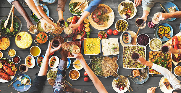 istock Friends Happiness Enjoying Dinning Eating Concept 519399062