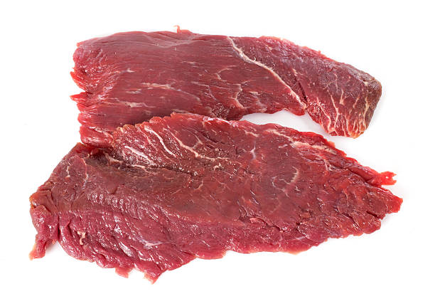 Flank steak Flank steak in front of white background flank steak stock pictures, royalty-free photos & images