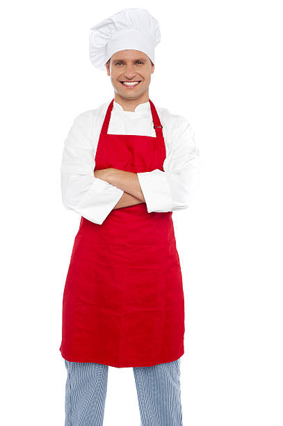 istock Confident cheerful male chef with arms crossed 519403181
