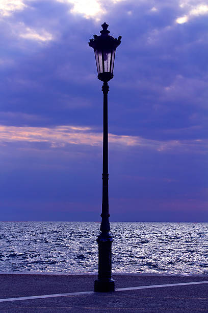 istock Sea and streetlight late night 519403835