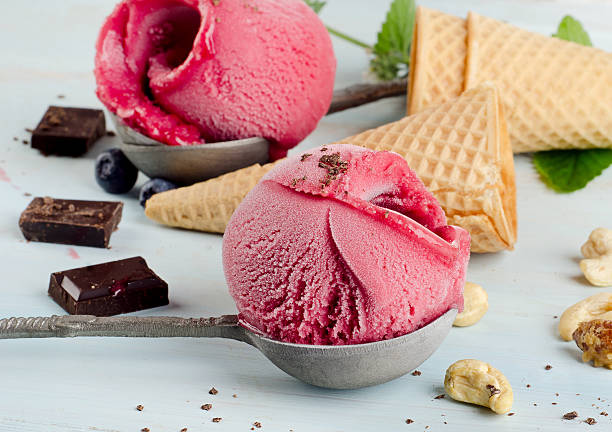 istock Ice cream with berries and chocolate 519404611