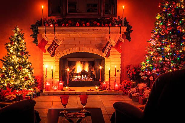 istock Christmas living room with fireplace and presents under tree (P) 519406551