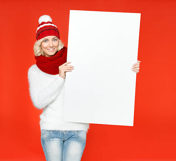 istock Beautiful young woman with wish list 519407803