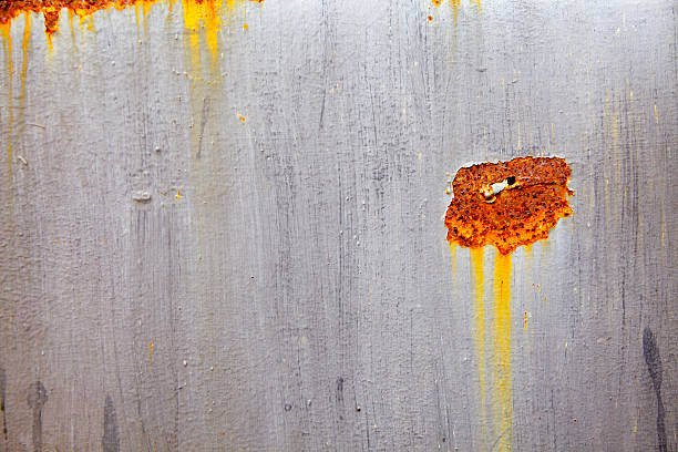 istock old black and yellow metal wall 519409887