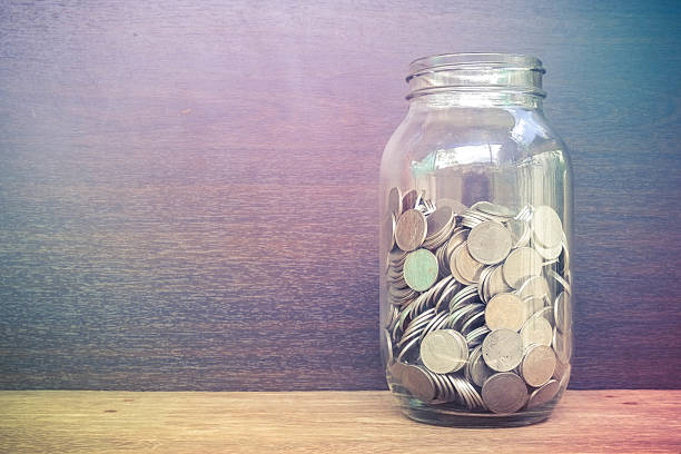 istock money in the glass with filter effect retro vintage style 519420456