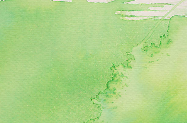 istock green watercolor painted background 519421392