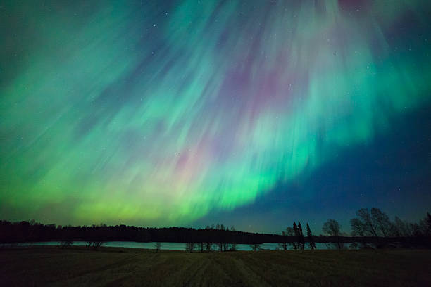 istock Northern lights aurora borealis landscape 519422618