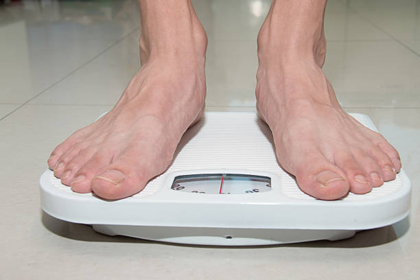 istock Closeup of a Asians weighed 519424620